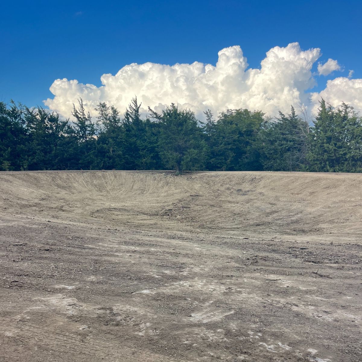 after photo showing a pond cleanout and expansion in Paris, Texas