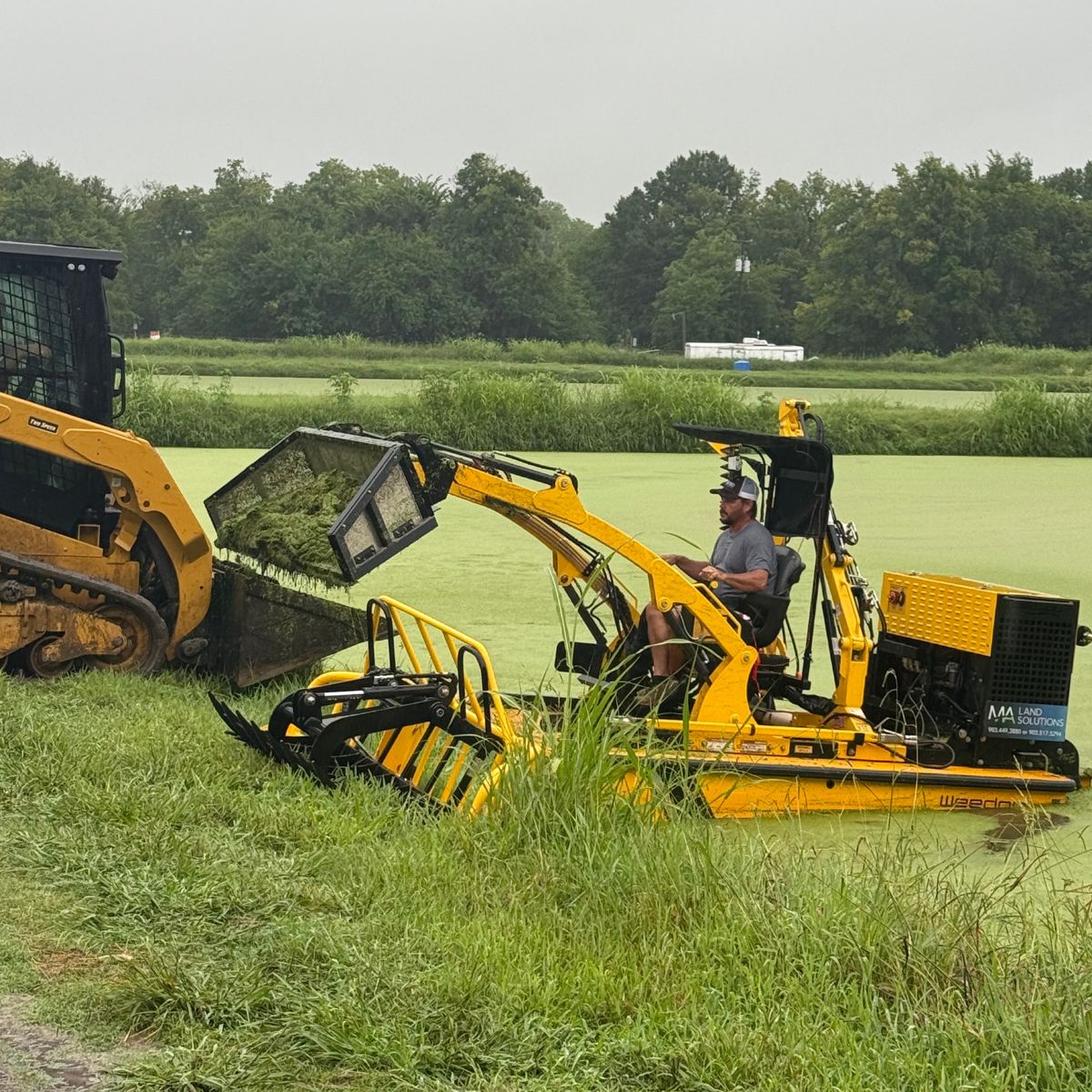 cleaning out a municipal water detention pond in Deport, Texas