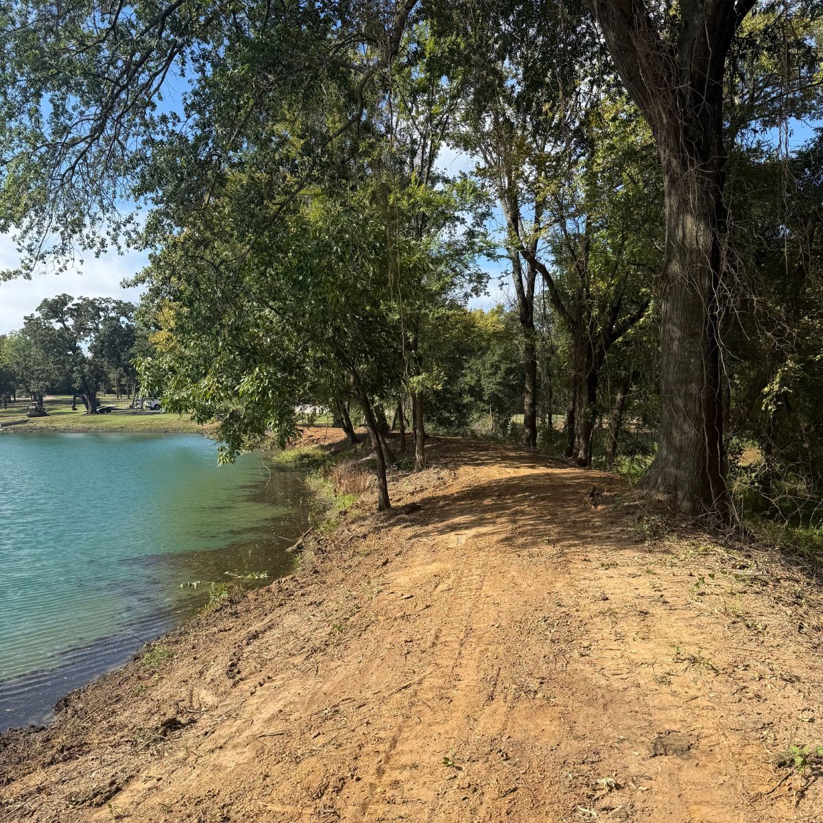 dam and cleaned area on a lake in Paris, Texas